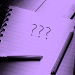 notebook with question marks, purple filter
