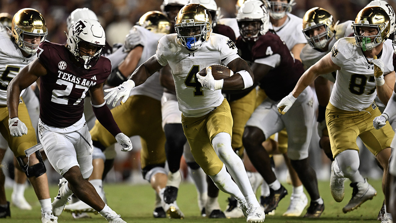 Jeremiyah Love 4 of the Notre Dame Fighting Irish rushes for a 21-yard touchdown against the Texas AM Aggies in the fourth quarter at Kyle Field on August 31, 2024 in College Station, Texas.